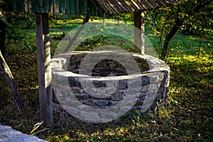 Abandoned well in the forest. Waiting for a terrible girl with a long hair