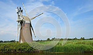 Abandoned Windmill next to the river Ant Norfolk broads