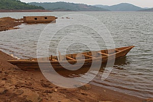 Abandoned Wood Boat in Kolab River