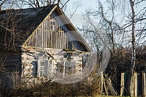 Abandoned wooden house in a dead village in the Chernobyl exclusion zone