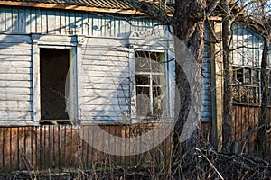 Abandoned wooden house in a dead village in the Chernobyl exclusion zone