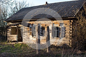 Abandoned wooden house in a dead village in the Chernobyl exclusion zone