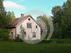 Abandoned wooden house in the forest of northern Sweden