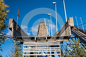 Abandoned wooden ski jumping hill on blue sky background in Kouvola, Finland