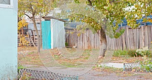 Abandoned yard of country house. Typical courtyard in the outback, quiet and peaceful everyday village life. Small barn