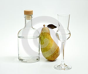 Abate Fetel pear with alcohol bottle and glass