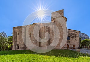Abbey of San Vittore alle Chiuse In the rays of the midday sun. Comune of Genga, Marche, Italy photo