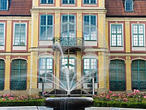 Abbots palace in gdansk oliva park. building with fountain