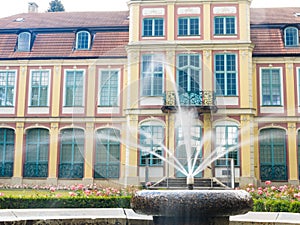 Abbots palace in gdansk oliva park. building with fountain