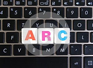Abbreviation ARC on keyboard background