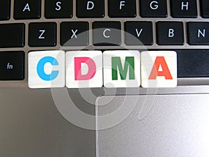 Abbreviation CDMA on keyboard background