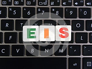Abbreviation EIS on keyboard background photo