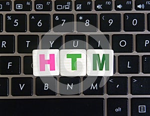 Abbreviation HTM on keyboard background