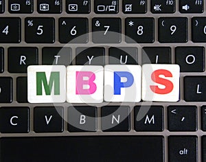 Abbreviation MBPS on keyboard background