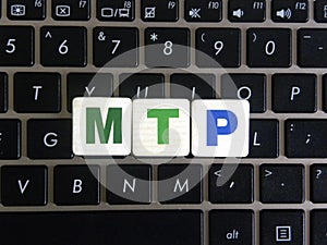 Abbreviation MTP on keyboard background