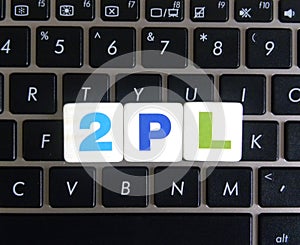 Abbreviation 2PL on keyboard background