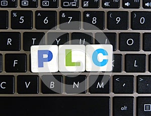 Abbreviation PLC on keyboard background