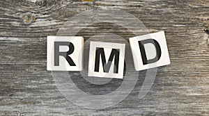 The abbreviation RMD is made from wooden building blocks