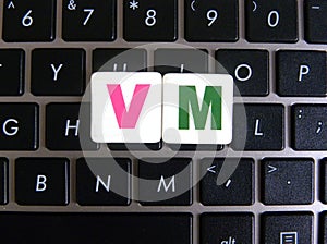 Abbreviation VM on keyboard background