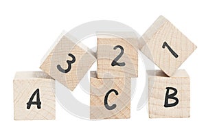 ABC 123 Arranged Using Wooden Blocks.