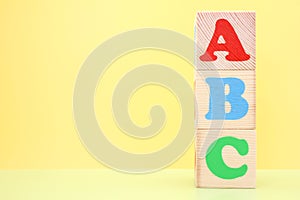 ABC -the first letters of the English alphabet on wooden toy cubes