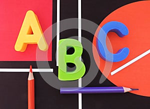 ABC letters alphabet and pncils on abstract background with geometric lines . education and back to school concept