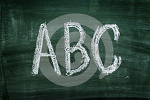 ABC letters on green chalkboard