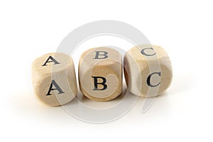 Abc, spelled with wooden blocks, isolated, white background