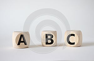 ABC symbol. Concept word ABC on wooden blocks. Beautiful white background. Business and ABC concept. Copy space