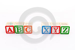 ABC and XYZ alphabet blocks isolated on white background photo