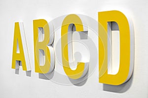 ABCD yellow alphabet letters