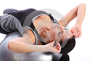 Abdominal crunches workout by caucasian woman