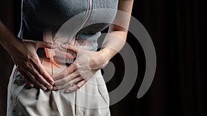 Abdominal pain woman, photo of large intestine on woman body, appendix pain. Health care concept