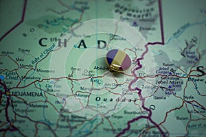 Abeche pinned on a map with the flag of Chad