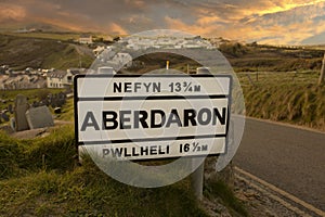 Aberdaron road sign in evening sunlight. Aberdaron is on the coast of the Llyn Peninsula in Gwynedd photo