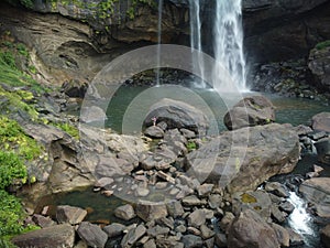 Aberdeen Falls is a picturesque 98 m high waterfall on the Kehelgamu River near Ginigathena, in the Nuwara Eliya District of Sri photo