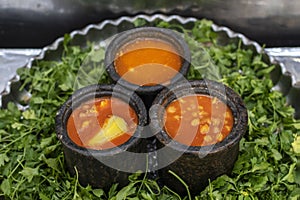 Abgoosht, also called Dizi, is an Iranian stew photo