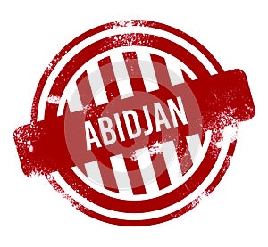 Abidjan - Red grunge button, stamp