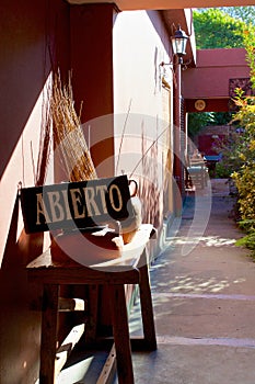 Abierto or open sign on shop in San Antonio de Areco, Argentina photo