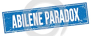 ABILENE PARADOX text on blue grungy rectangle stamp photo