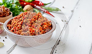 Abkhaz spicy dry adjika for meat in a bowl