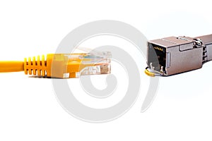 Ð¡able head into head rj45 of an ethernet wire cable or yellow patch-cord with twisted pair and SFP module,network,RJ45,plug.