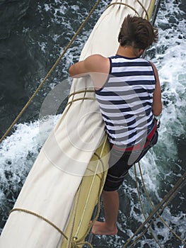 Seaman working aloft