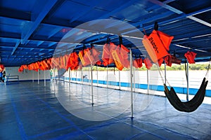 aboard a tourist boat that sails through the Amazon river basin. with hammock .