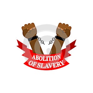 Abolition of slavery. Arm slave with broken shackles. Broken chain. photo