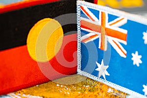 Aboriginal and Australian flag. Concept, common land. Settlers responsibility towards the indigenous people of Australia