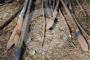 Aboriginal Australians weapons on the ground in Cape York Queensland Australia photo