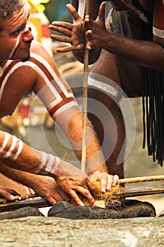 Aborigines actors making fire