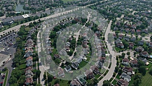 Above aerial view. Residential houses in suburbs near city .