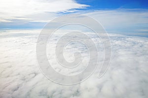 Above the cloud and blue sky